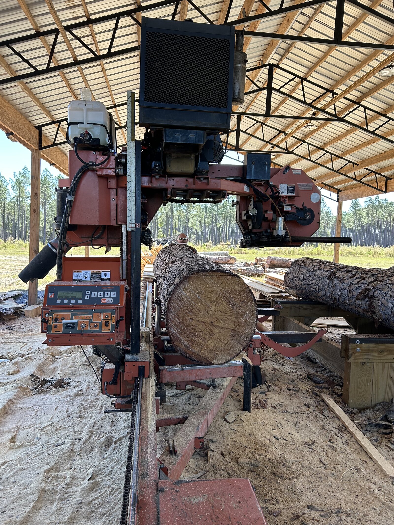 log on sawmill being cut